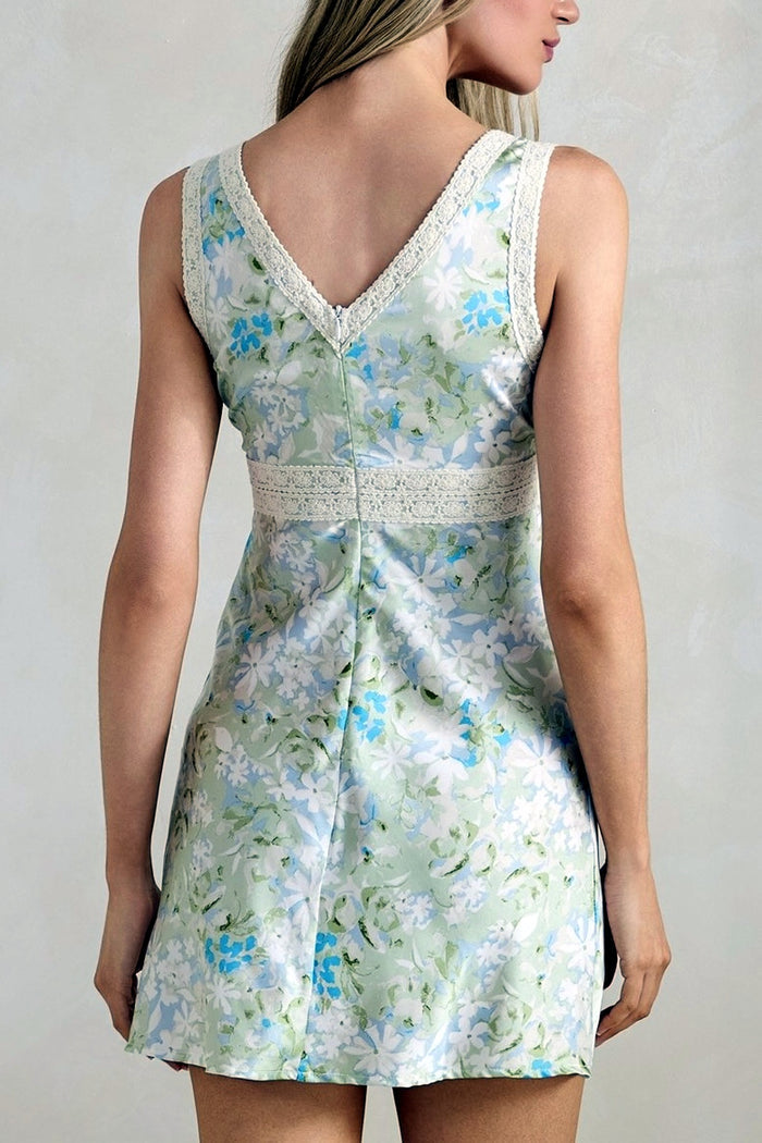 Woman wearing a floral dress with a white background