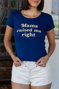 Person wearing a blue t-shirt with 'Mama raised me right' text, standing outdoors.